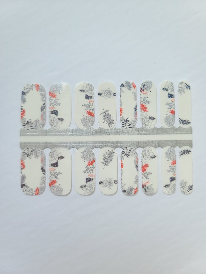 Fleurs et feuilles blanches, grises et rouges
