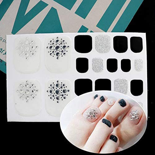 Pedicure Silver Dots avec fond clair, enveloppements d'ongles d'orteil à paillettes noires et argentées