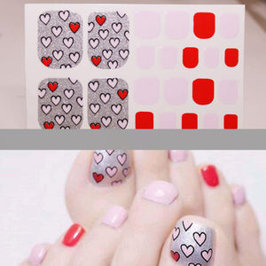 Light Pink and Red Black Outline Hearts on Silver Glitter Toe Nails