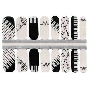 Notes de clé de musique et clavier de piano noir et blanc scintillant